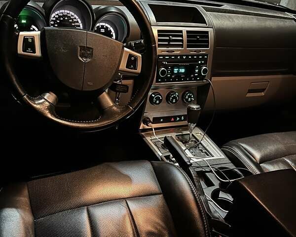 Черный Додж Нитро, объемом двигателя 3.7 л и пробегом 195 тыс. км за 9900 $, фото 12 на Automoto.ua