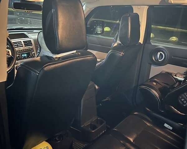 Черный Додж Нитро, объемом двигателя 3.7 л и пробегом 195 тыс. км за 9900 $, фото 7 на Automoto.ua