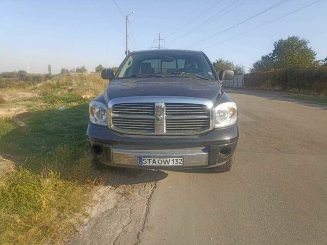 Черный Додж РАМ, объемом двигателя 5.7 л и пробегом 158 тыс. км за 9800 $, фото 1 на Automoto.ua