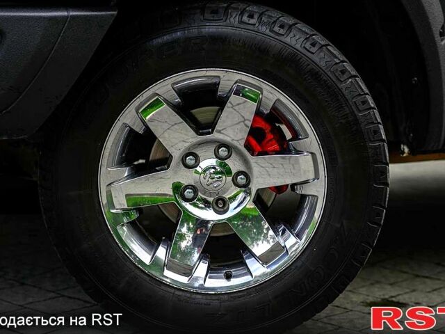 Черный Додж РАМ, объемом двигателя 5.7 л и пробегом 70 тыс. км за 25000 $, фото 3 на Automoto.ua