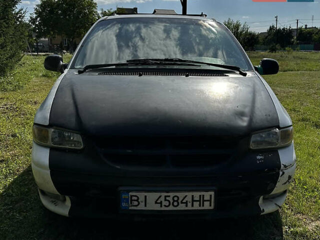 Белый Додж Рам Ван, объемом двигателя 2.5 л и пробегом 430 тыс. км за 1500 $, фото 1 на Automoto.ua