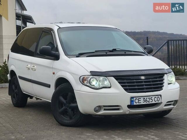 Белый Додж Рам Ван, объемом двигателя 2.5 л и пробегом 201 тыс. км за 4999 $, фото 1 на Automoto.ua