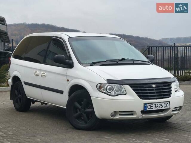 Белый Додж Рам Ван, объемом двигателя 2.5 л и пробегом 201 тыс. км за 4999 $, фото 2 на Automoto.ua