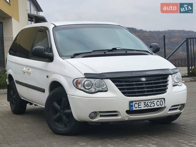 Белый Додж Рам Ван, объемом двигателя 2.5 л и пробегом 201 тыс. км за 4999 $, фото 3 на Automoto.ua