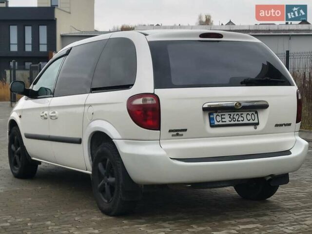 Белый Додж Рам Ван, объемом двигателя 2.5 л и пробегом 201 тыс. км за 4999 $, фото 21 на Automoto.ua