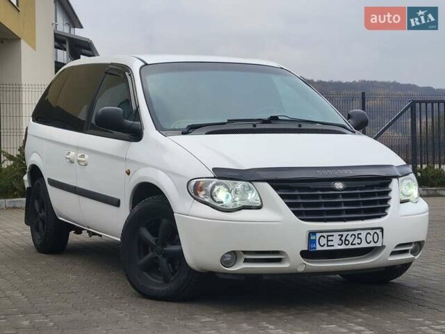 Белый Додж Рам Ван, объемом двигателя 2.5 л и пробегом 201 тыс. км за 4999 $, фото 7 на Automoto.ua