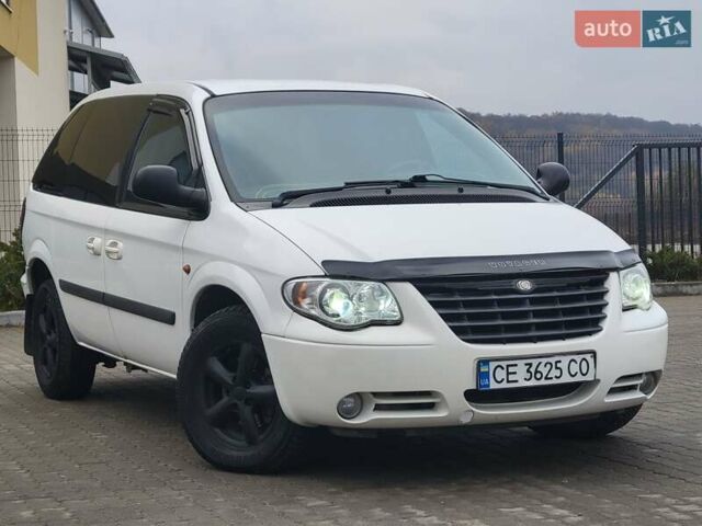 Белый Додж Рам Ван, объемом двигателя 2.5 л и пробегом 201 тыс. км за 4999 $, фото 8 на Automoto.ua