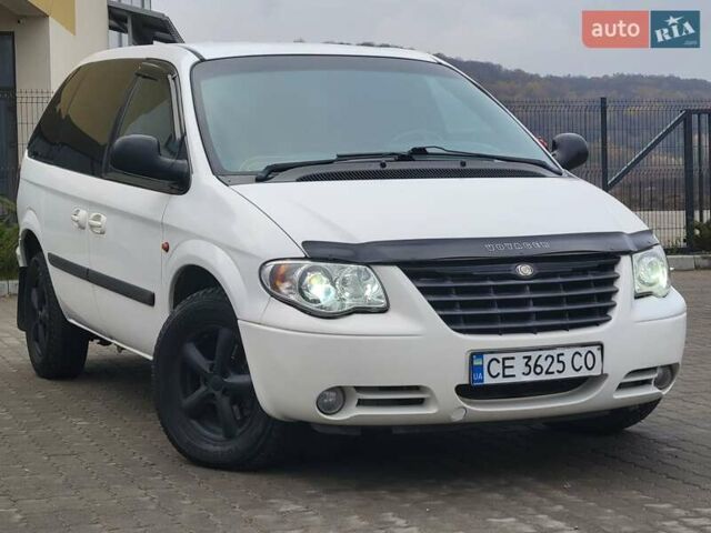 Белый Додж Рам Ван, объемом двигателя 2.5 л и пробегом 201 тыс. км за 4999 $, фото 6 на Automoto.ua
