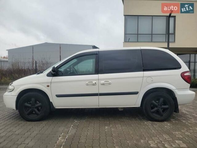 Белый Додж Рам Ван, объемом двигателя 2.5 л и пробегом 201 тыс. км за 4999 $, фото 23 на Automoto.ua