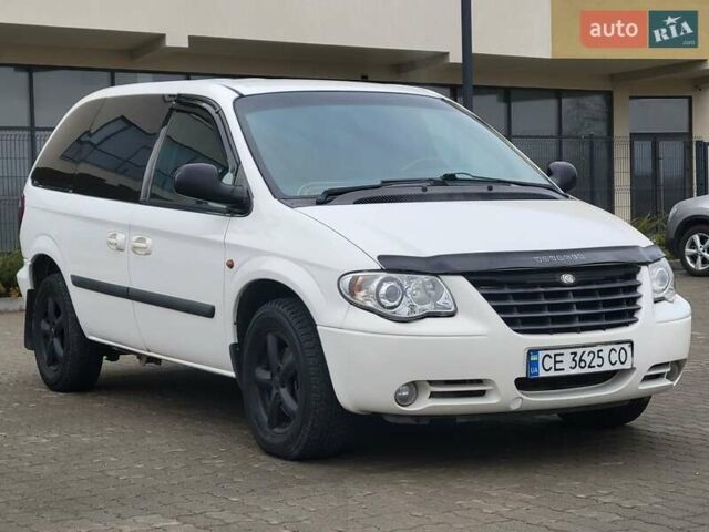 Белый Додж Рам Ван, объемом двигателя 2.5 л и пробегом 201 тыс. км за 4999 $, фото 15 на Automoto.ua