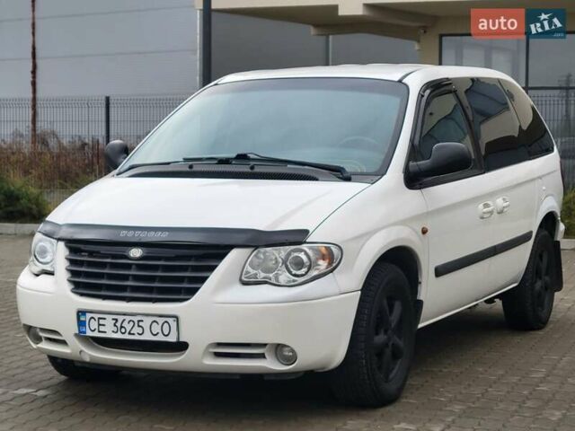 Белый Додж Рам Ван, объемом двигателя 2.5 л и пробегом 201 тыс. км за 4999 $, фото 13 на Automoto.ua