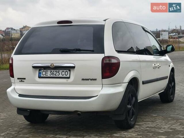 Белый Додж Рам Ван, объемом двигателя 2.5 л и пробегом 201 тыс. км за 4999 $, фото 19 на Automoto.ua