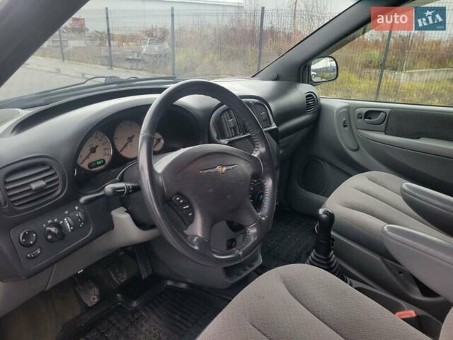 Белый Додж Рам Ван, объемом двигателя 2.5 л и пробегом 201 тыс. км за 4999 $, фото 24 на Automoto.ua