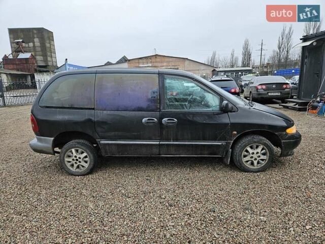 Черный Додж Рам Ван, объемом двигателя 2.5 л и пробегом 127 тыс. км за 2450 $, фото 6 на Automoto.ua