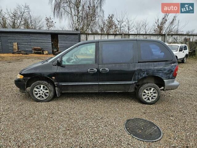 Черный Додж Рам Ван, объемом двигателя 2.5 л и пробегом 127 тыс. км за 2450 $, фото 7 на Automoto.ua