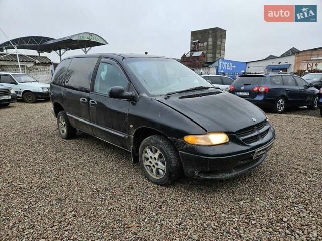 Черный Додж Рам Ван, объемом двигателя 2.5 л и пробегом 127 тыс. км за 2450 $, фото 1 на Automoto.ua