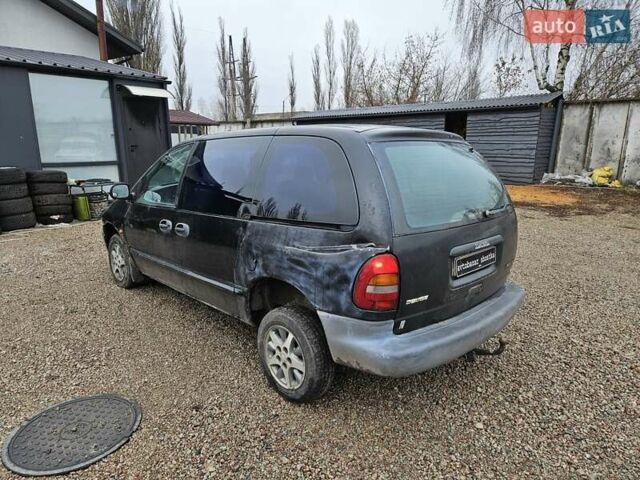 Черный Додж Рам Ван, объемом двигателя 2.5 л и пробегом 127 тыс. км за 2450 $, фото 5 на Automoto.ua