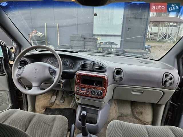 Черный Додж Рам Ван, объемом двигателя 2.5 л и пробегом 127 тыс. км за 2450 $, фото 10 на Automoto.ua