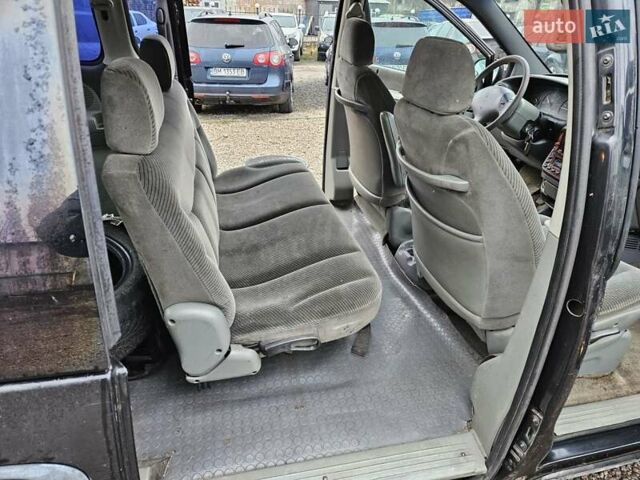 Черный Додж Рам Ван, объемом двигателя 2.5 л и пробегом 127 тыс. км за 2450 $, фото 12 на Automoto.ua