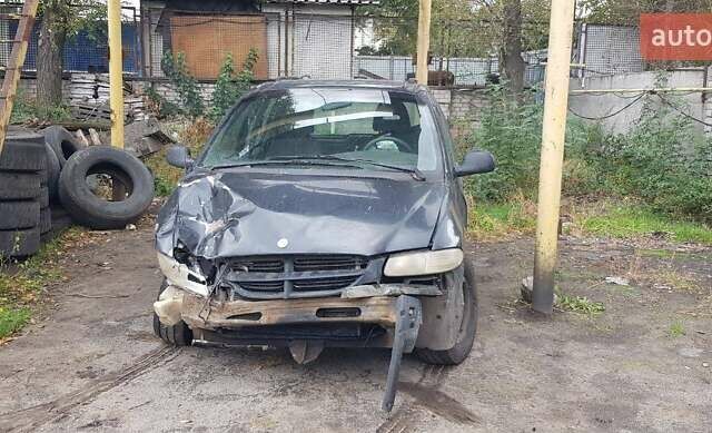 Черный Додж Рам Ван, объемом двигателя 2.5 л и пробегом 250 тыс. км за 1198 $, фото 2 на Automoto.ua