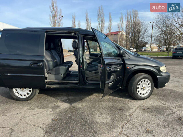 Черный Додж Рам Ван, объемом двигателя 2.5 л и пробегом 200 тыс. км за 2999 $, фото 12 на Automoto.ua