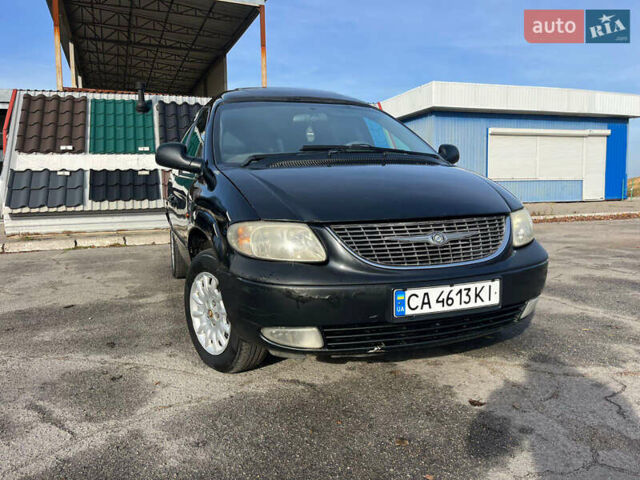 Черный Додж Рам Ван, объемом двигателя 2.5 л и пробегом 200 тыс. км за 2999 $, фото 6 на Automoto.ua