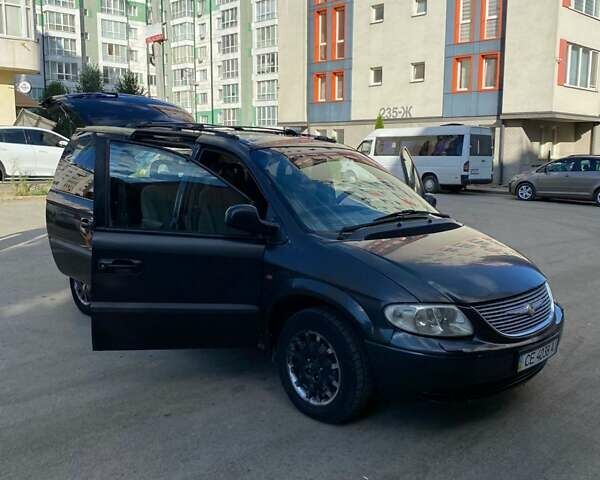 Черный Додж Рам Ван, объемом двигателя 2.5 л и пробегом 435 тыс. км за 3800 $, фото 4 на Automoto.ua