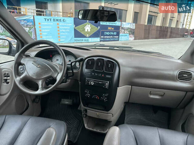 Черный Додж Рам Ван, объемом двигателя 2.5 л и пробегом 200 тыс. км за 2999 $, фото 26 на Automoto.ua