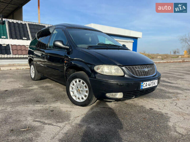 Черный Додж Рам Ван, объемом двигателя 2.5 л и пробегом 200 тыс. км за 2999 $, фото 3 на Automoto.ua