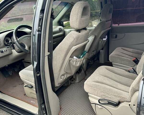 Черный Додж Рам Ван, объемом двигателя 2.5 л и пробегом 225 тыс. км за 5600 $, фото 11 на Automoto.ua