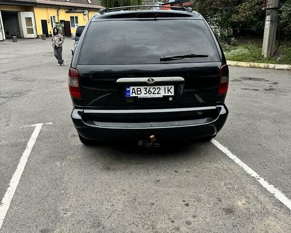 Черный Додж Рам Ван, объемом двигателя 2.5 л и пробегом 225 тыс. км за 5600 $, фото 3 на Automoto.ua