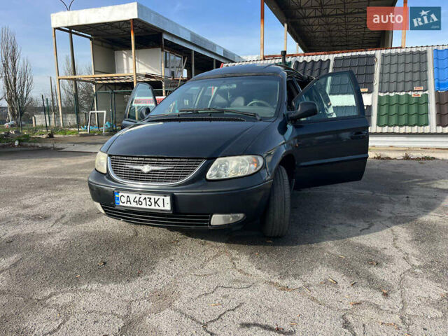 Черный Додж Рам Ван, объемом двигателя 2.5 л и пробегом 200 тыс. км за 2999 $, фото 16 на Automoto.ua