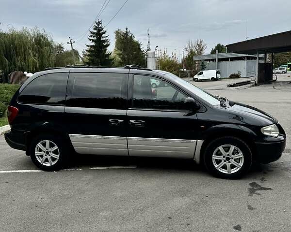 Черный Додж Рам Ван, объемом двигателя 2.5 л и пробегом 225 тыс. км за 5600 $, фото 5 на Automoto.ua