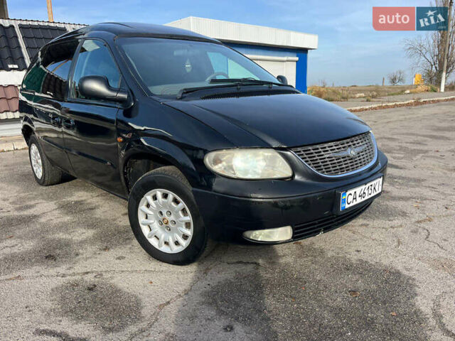 Черный Додж Рам Ван, объемом двигателя 2.5 л и пробегом 200 тыс. км за 2999 $, фото 24 на Automoto.ua