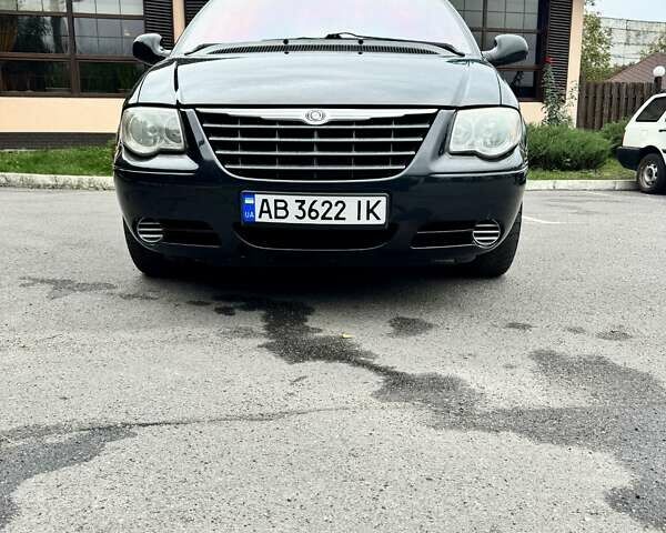 Черный Додж Рам Ван, объемом двигателя 2.5 л и пробегом 225 тыс. км за 5600 $, фото 2 на Automoto.ua