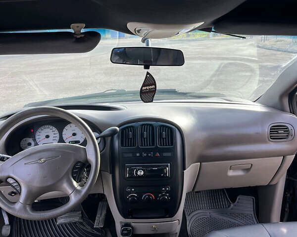 Черный Додж Рам Ван, объемом двигателя 2.5 л и пробегом 200 тыс. км за 2999 $, фото 11 на Automoto.ua