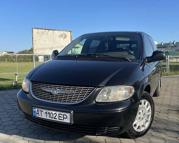 Черный Додж Рам Ван, объемом двигателя 2.5 л и пробегом 297 тыс. км за 3950 $, фото 2 на Automoto.ua