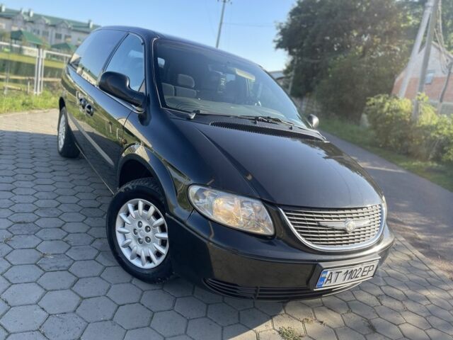 Черный Додж Рам Ван, объемом двигателя 2.5 л и пробегом 297 тыс. км за 3950 $, фото 1 на Automoto.ua