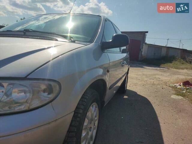 Серый Додж Рам Ван, объемом двигателя 2.5 л и пробегом 409 тыс. км за 3500 $, фото 7 на Automoto.ua
