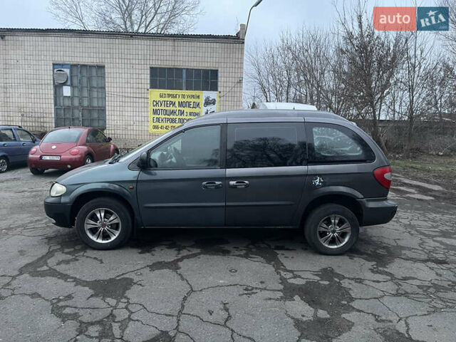 Серый Додж Рам Ван, объемом двигателя 2.4 л и пробегом 150 тыс. км за 2000 $, фото 8 на Automoto.ua