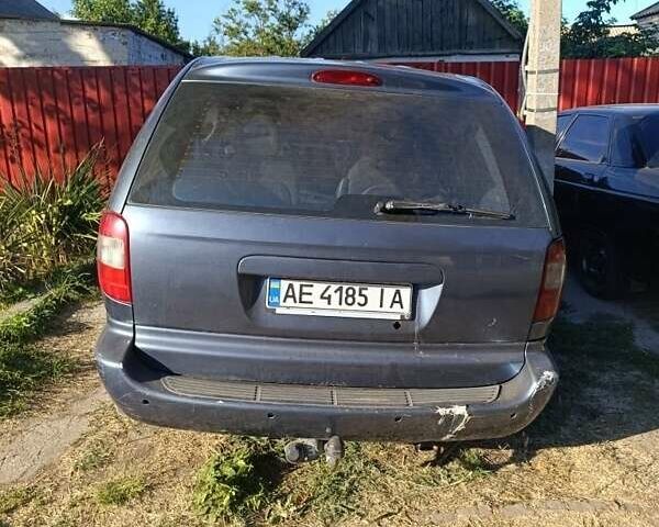 Серый Додж Рам Ван, объемом двигателя 2.5 л и пробегом 300 тыс. км за 2910 $, фото 1 на Automoto.ua
