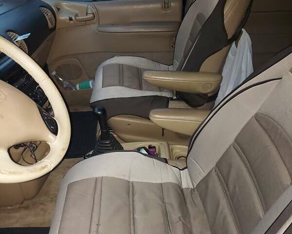 Синий Додж Рам Ван, объемом двигателя 2.4 л и пробегом 377 тыс. км за 2500 $, фото 1 на Automoto.ua