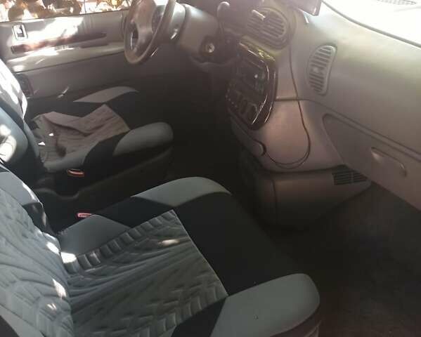 Синий Додж Рам Ван, объемом двигателя 2.5 л и пробегом 200 тыс. км за 2354 $, фото 1 на Automoto.ua