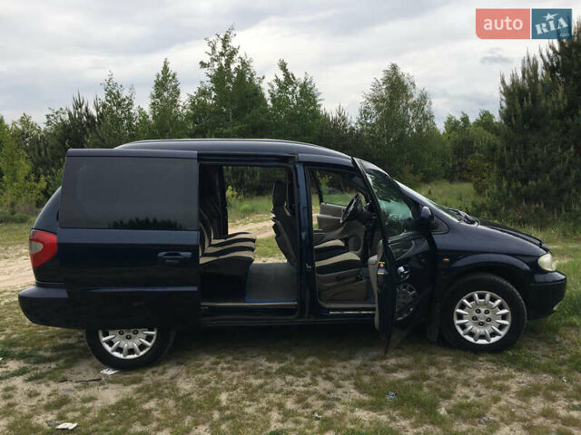 Синий Додж Рам Ван, объемом двигателя 2.5 л и пробегом 320 тыс. км за 3550 $, фото 12 на Automoto.ua