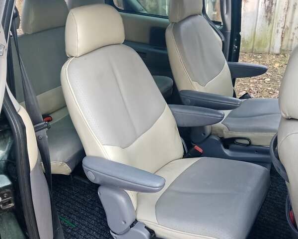 Зеленый Додж Рам Ван, объемом двигателя 2.5 л и пробегом 440 тыс. км за 3200 $, фото 11 на Automoto.ua
