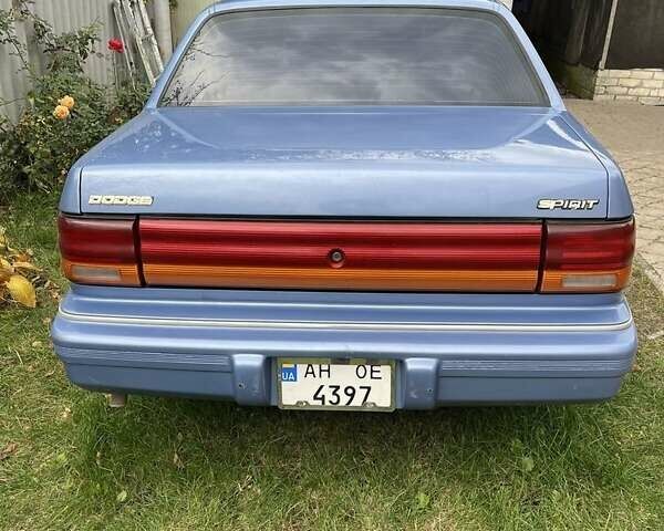 Синий Додж Спирит, объемом двигателя 2.5 л и пробегом 100 тыс. км за 2300 $, фото 1 на Automoto.ua