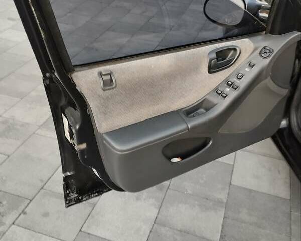 Чорний Додж Стратус, об'ємом двигуна 2 л та пробігом 170 тис. км за 3300 $, фото 12 на Automoto.ua