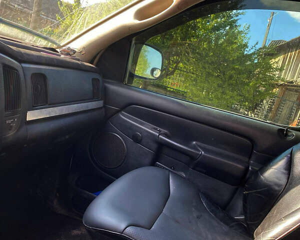 Белый Додж RAM 1500, объемом двигателя 4.7 л и пробегом 316 тыс. км за 8700 $, фото 1 на Automoto.ua