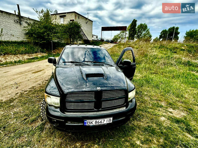 Черный Додж RAM 1500, объемом двигателя 4.7 л и пробегом 82 тыс. км за 8700 $, фото 2 на Automoto.ua