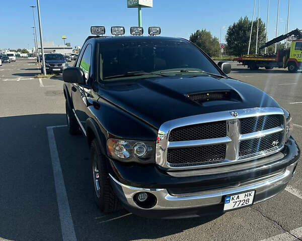 Черный Додж RAM 1500, объемом двигателя 3.7 л и пробегом 200 тыс. км за 10000 $, фото 1 на Automoto.ua
